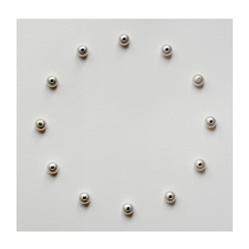 Still-Point. Sandblasted text - Time unravels with a whisper. Sandblasted glass, paper, 24ct gold leaf, sterling silver watch winders, 2.5mm black diamonds, 2.5mm white diamond. Frame size - 767mm wide x 465mm high x 50mm deep. 2014